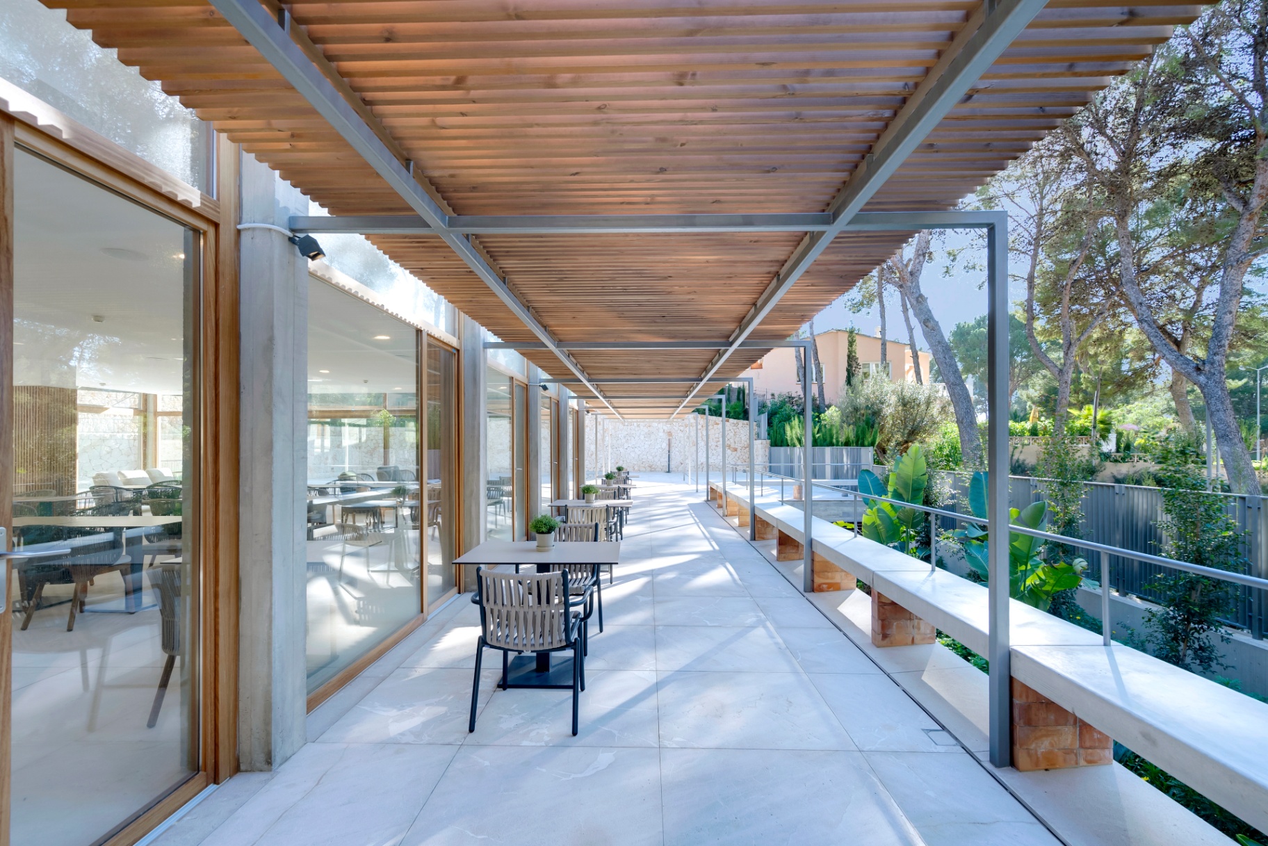 Terrace dining under pergola